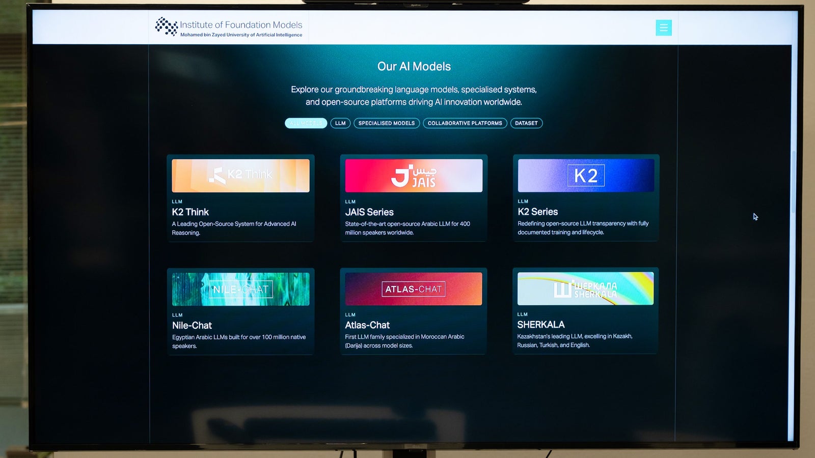 Screen displaying various AI models, including K2 Think, JAIS Series, K2 Series, Nile-Chat, Atlas-Chat, and SHERKALA.