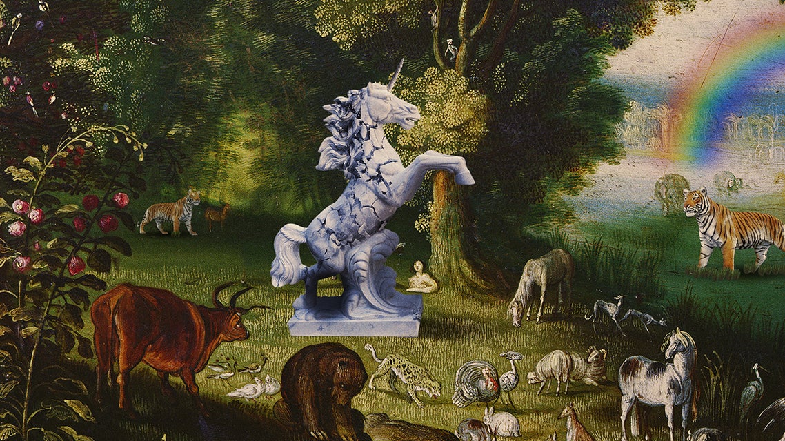 A fantasy scene featuring a cracked unicorn statue surrounded by various animals in a lush green setting with a rainbow in the background.