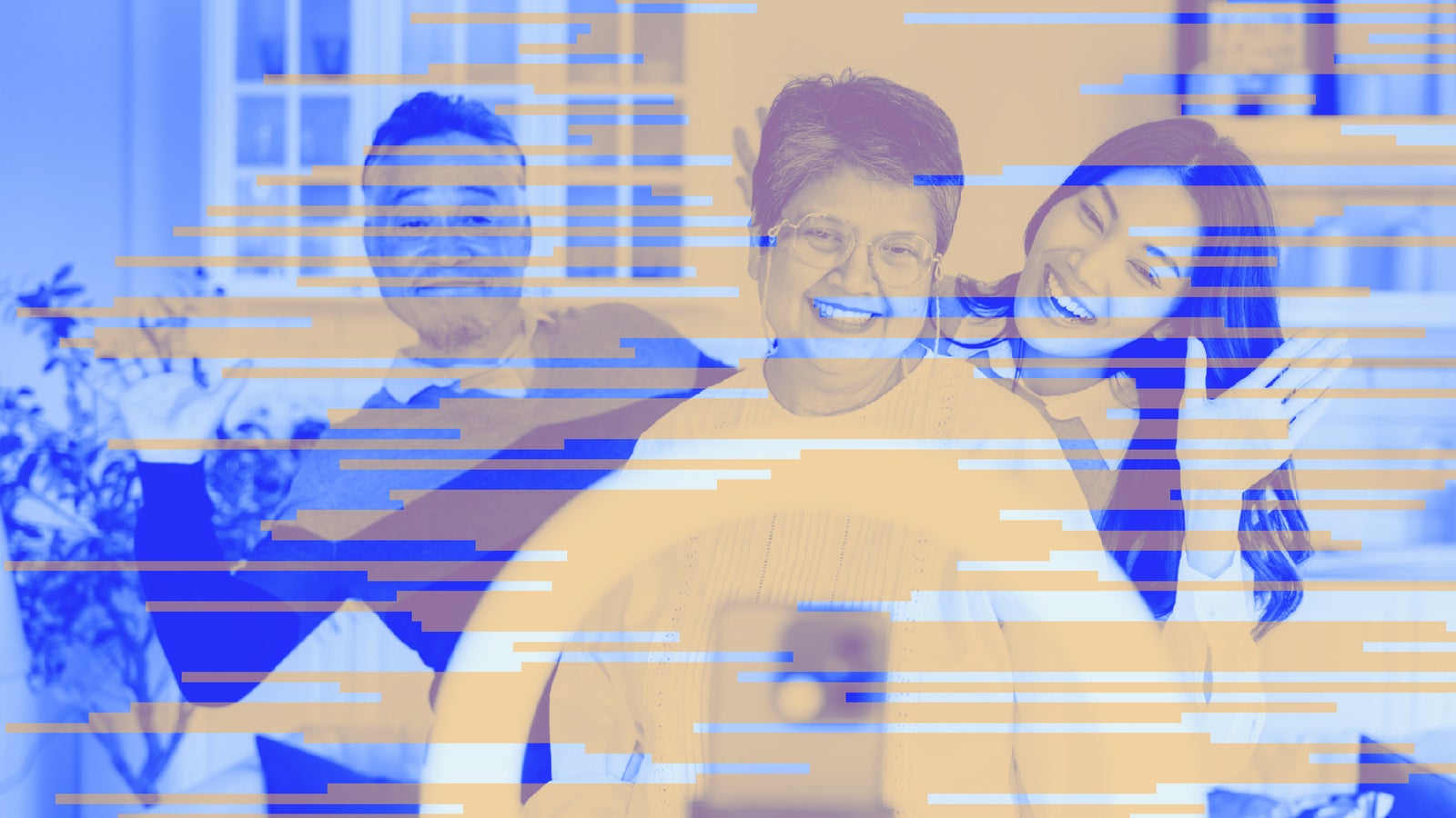 Three people pose joyfully in front of a smartphone within a ring light, making gestures and smiling