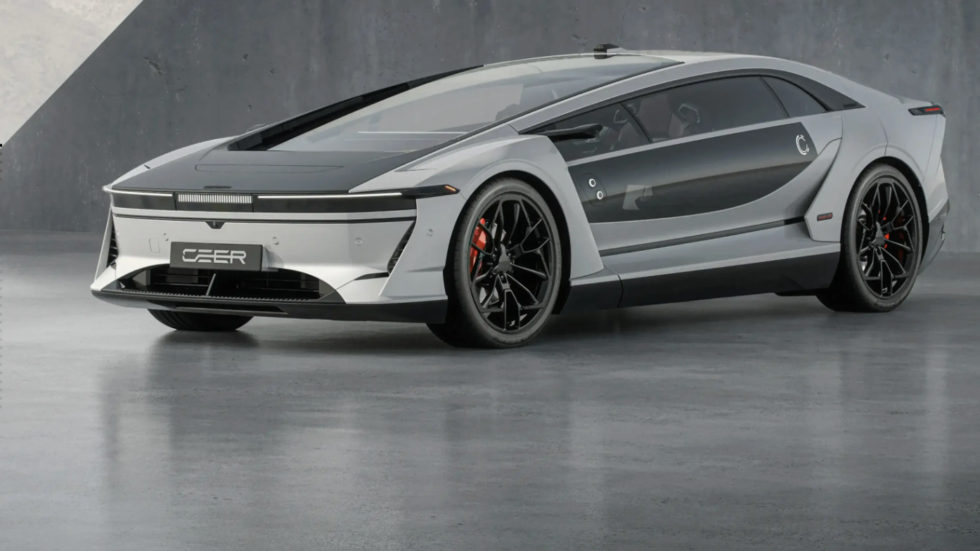 A sleek, futuristic silver sports car with distinctive design features parked on a concrete surface